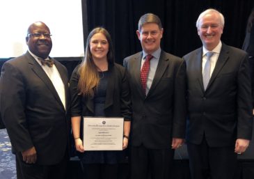 From Left to Right: Greg Winfree, Texas A&M Transportation Institute Agency Director; Ayla Moretti, Ph.D. student at University of California, Riverside, and student of the year for the Center for Advancing Research in Transportation Emissions, Energy and Health (CARTEEH); Joe Zietsman, CARTEEH Director; and Jeff Rosen, Deputy Secretary of the U.S. Department of Transportation.