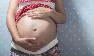 Photograph: of pregnant woman Rex/Shutterstock