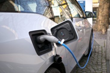 image of a BMW electric vehicle charging Photo Credit: Energy Innovation
