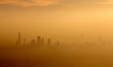 Image: Aerial view south across the city of London in fog and or air pollution. Photograph credit: Andrew Holt/Getty Images