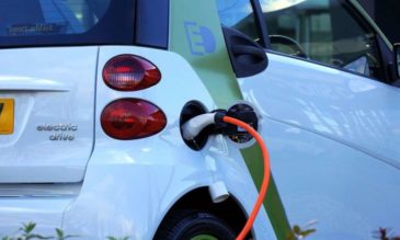 image of electric car plugged in